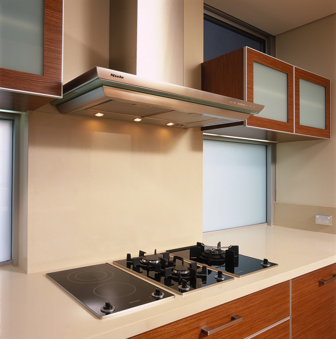 view of this this miele gas wok burner cabinetry, countertop, glass, interior design, kitchen, under cabinet lighting, orange, brown