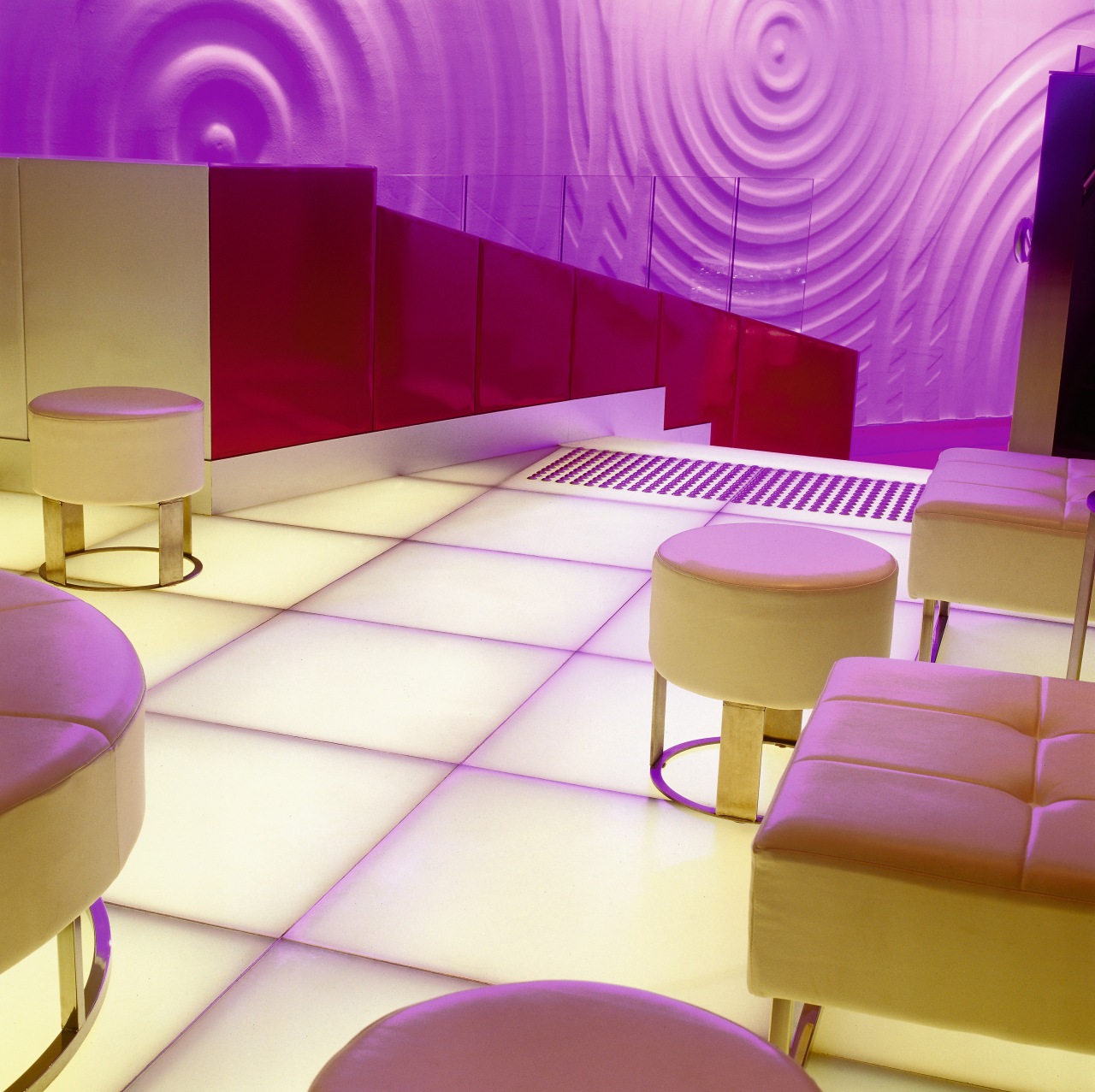 Bar lounge area with round stools, feature wall ceiling, design, floor, flooring, furniture, interior design, light, lighting, magenta, pink, product design, purple, table