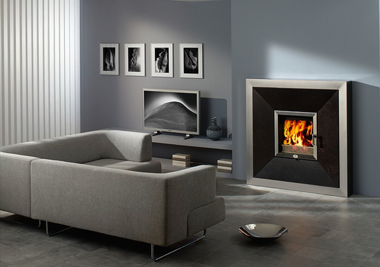 view of the wood burning max blank stove angle, couch, fireplace, furniture, hearth, heat, home appliance, interior design, product, product design, wood burning stove, gray, black