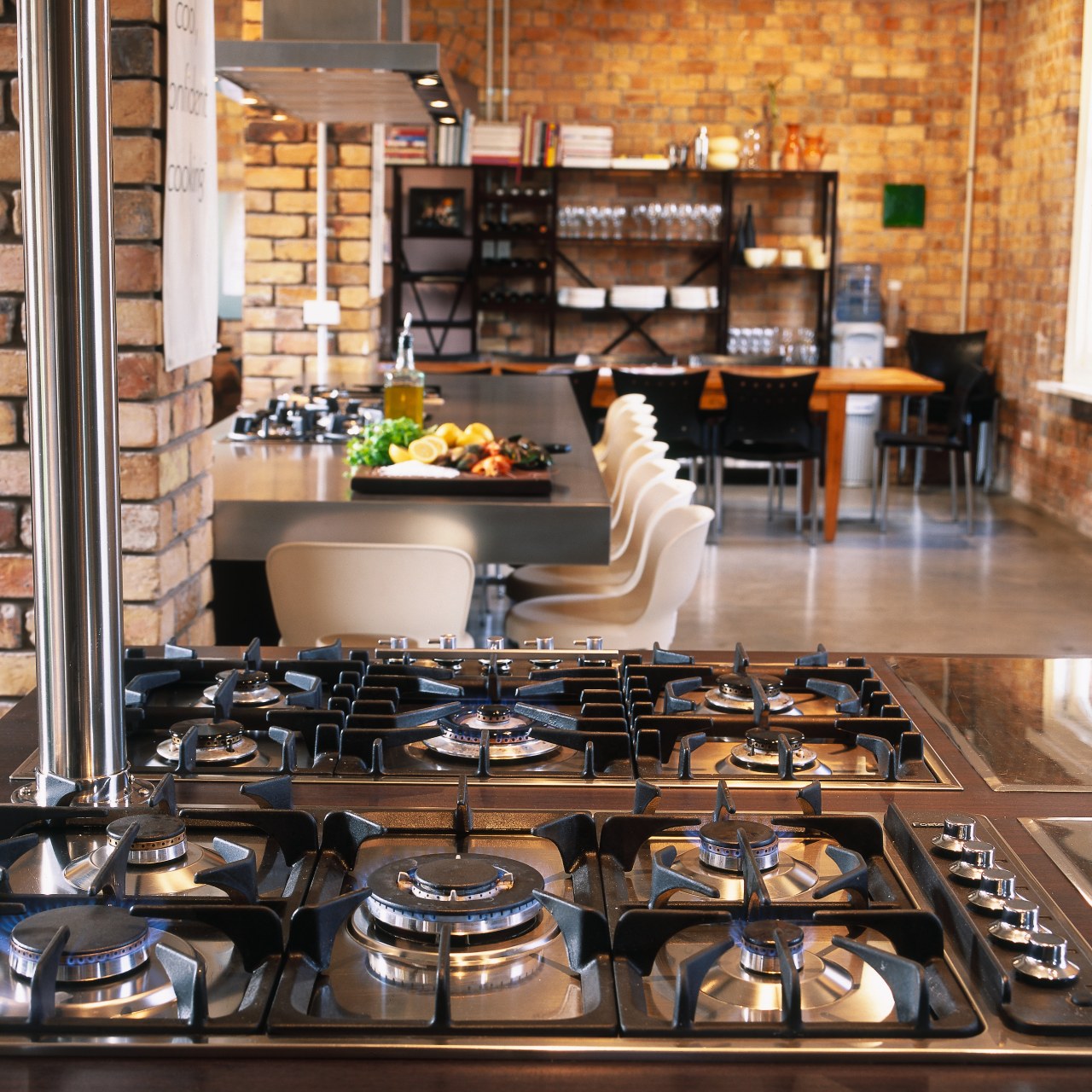 Kitchen with large gas cooktops, stainless steel benches brunch, countertop, interior design, kitchen, black