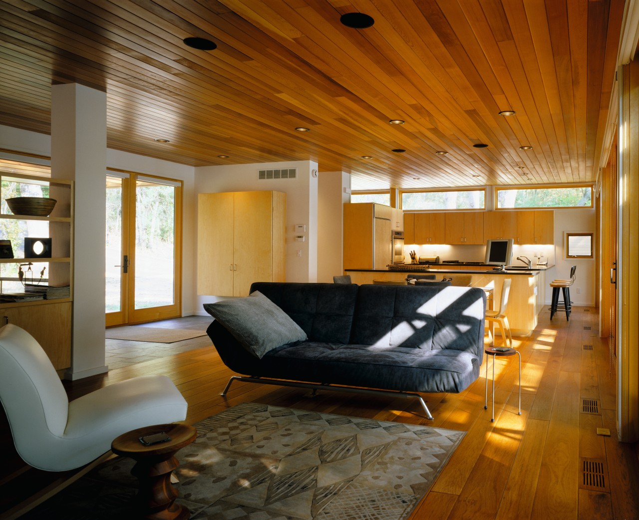 view of the open plan living area featuring architecture, ceiling, floor, flooring, hardwood, house, interior design, living room, real estate, room, wood, wood flooring, brown