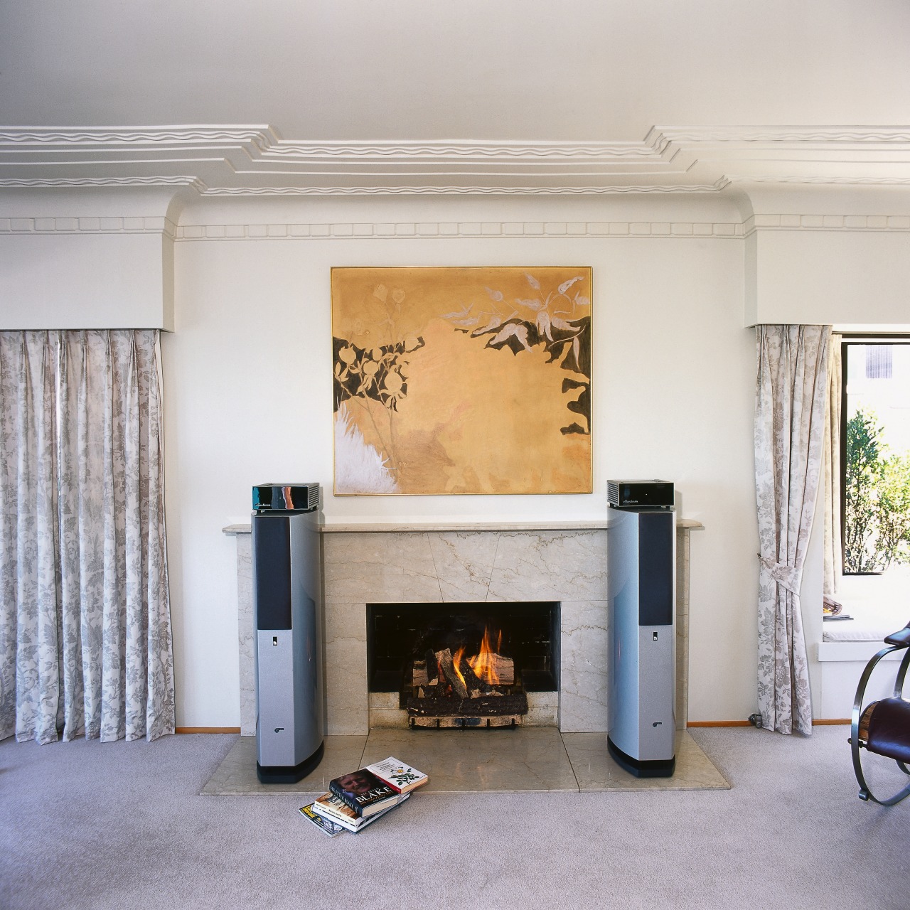 view of the bravo fx-10 speakers that are fireplace, floor, hearth, home, interior design, living room, wood burning stove, gray