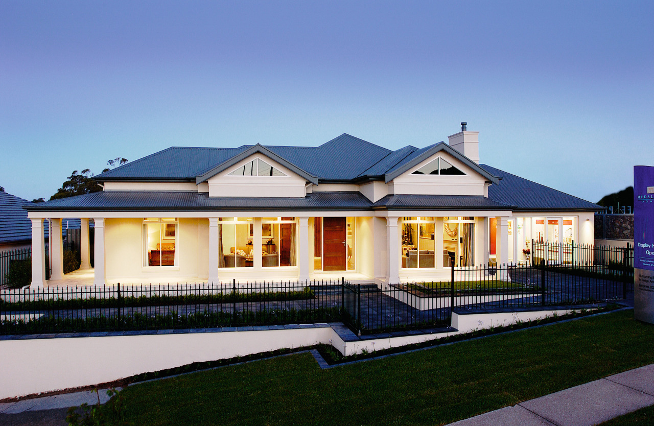 An exterior view of a plastered house, lawns elevation, estate, facade, home, house, mansion, property, real estate, residential area, roof, villa, window, teal