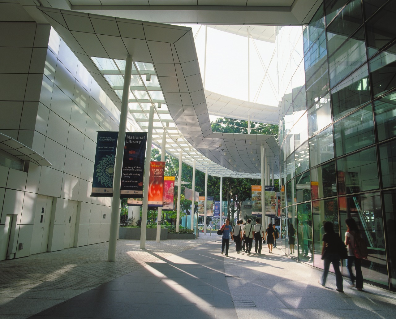 View of the street seperating the two seperate airport terminal, architecture, building, daylighting, metropolitan area, mixed use, shopping mall, skyway, gray, black