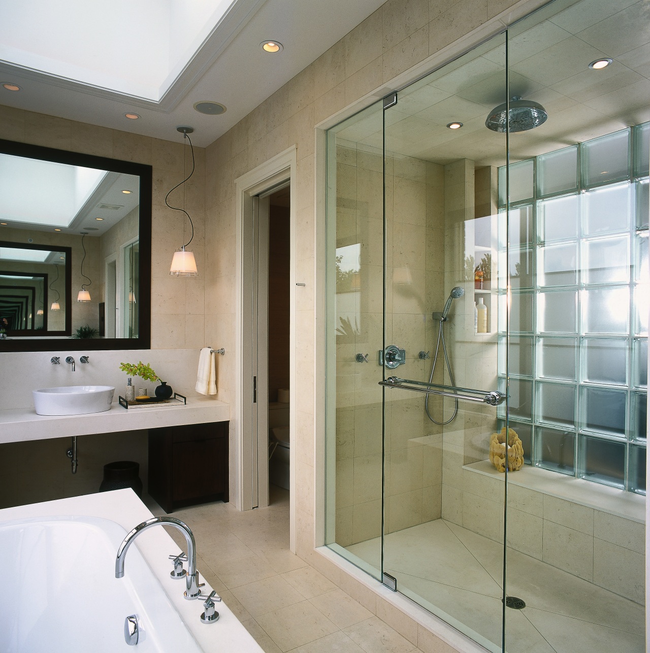 view of this bathroom featuring rnoan-nu tone stylish bathroom, glass, interior design, room, window, gray