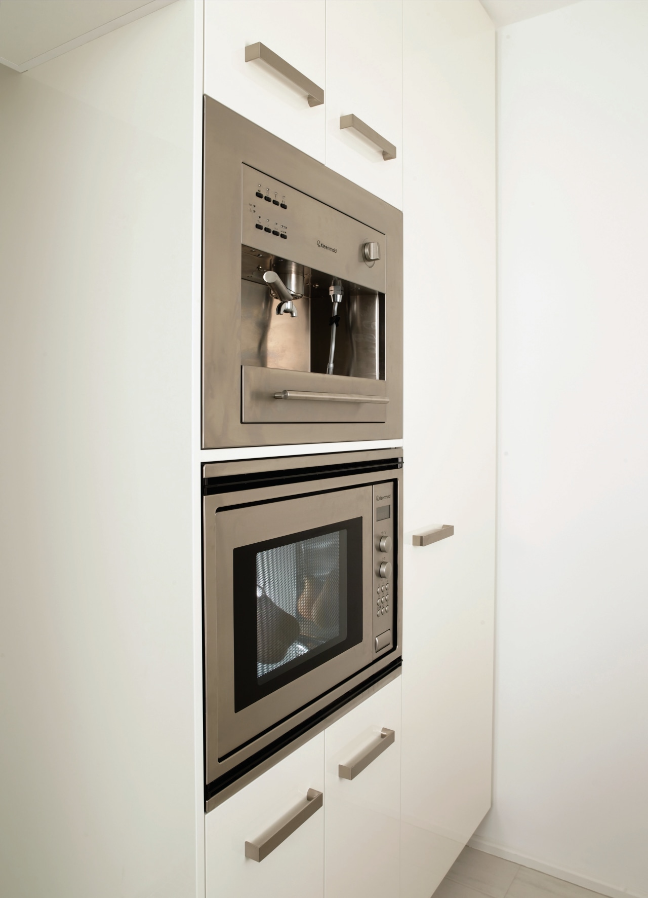 A view of a kitchen area, white cabinetry, furniture, home appliance, kitchen appliance, major appliance, product design, white