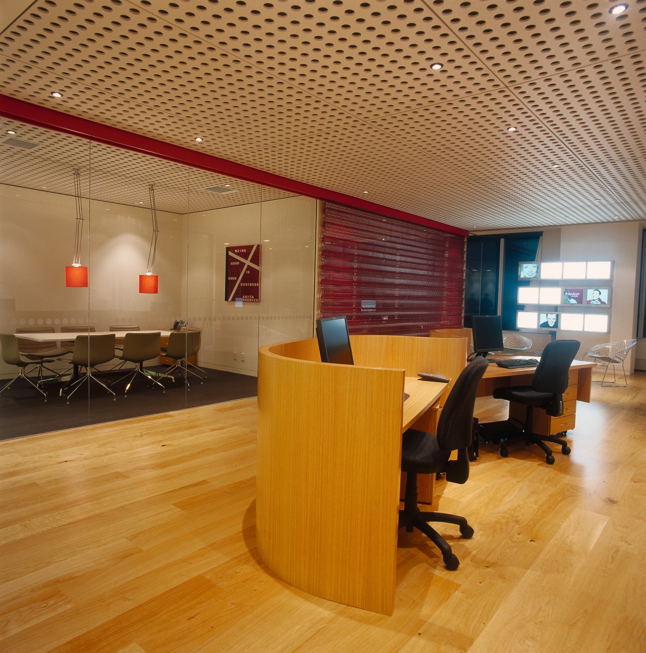 An interior view of the Lumley building. architecture, ceiling, floor, flooring, furniture, hardwood, interior design, laminate flooring, lobby, table, wall, wood, wood flooring, orange, brown