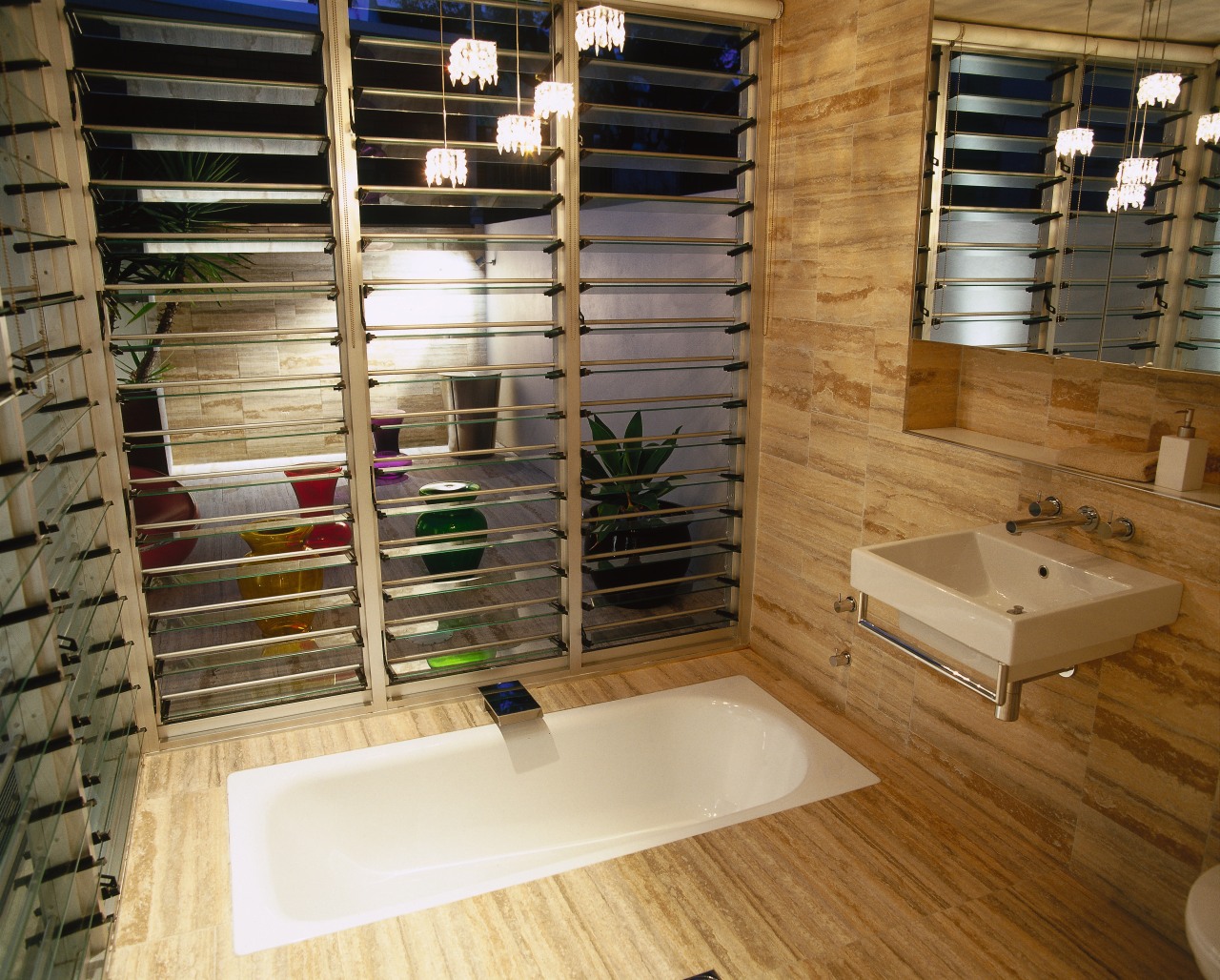 view of the bathroom featuring glass louvres, timber bathroom, floor, flooring, room, wood, brown