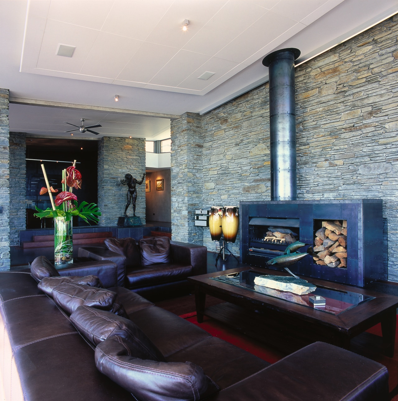 view of the large steel fireplace  custom ceiling, hearth, home, interior design, living room, lobby, real estate, room, wall, black, gray