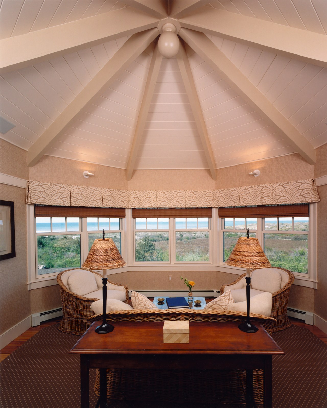 Octagonal sitting room with vaulted ceiling, wicker furniture ceiling, daylighting, estate, home, interior design, living room, real estate, room, shade, window, orange