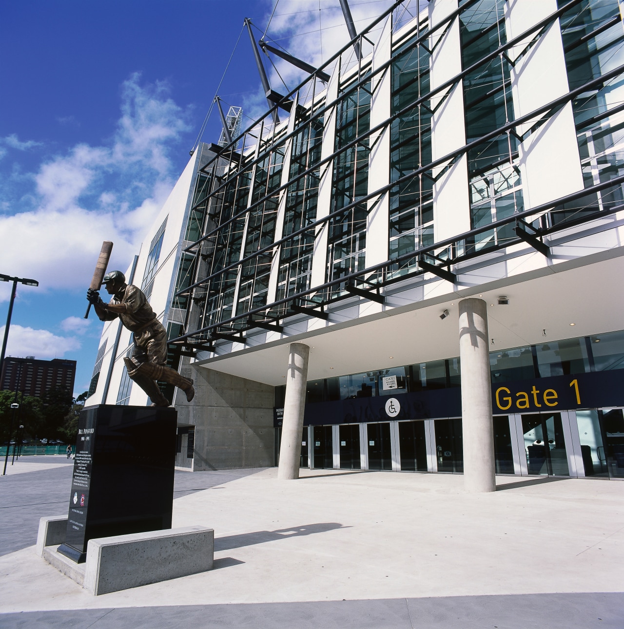 Entranceway to one of the MCG stadium stands architecture, building, condominium, corporate headquarters, landmark, structure, tourist attraction, white, black