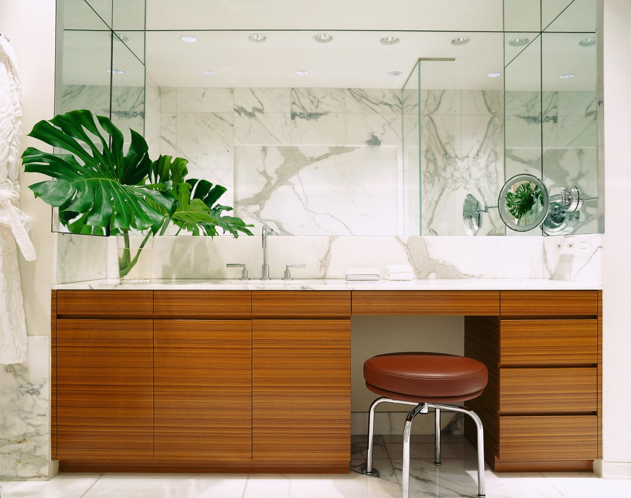 view of this bathroom featuring marble vein walls,floor furniture, interior design, product design, table, wall, white, brown