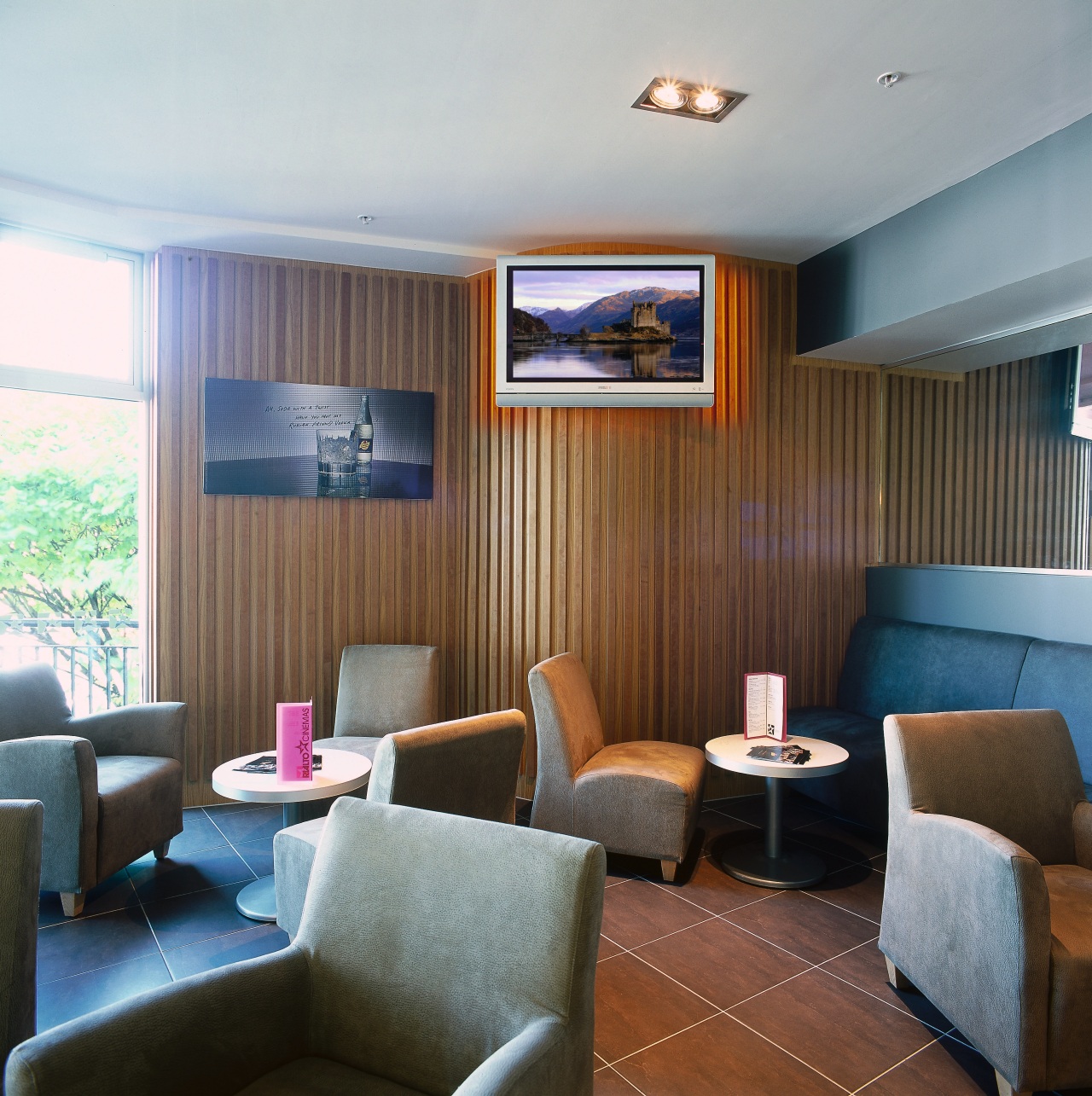 Cafeteria area with wall mounted plasma television screen. ceiling, interior design, living room, real estate, room, suite, gray, brown