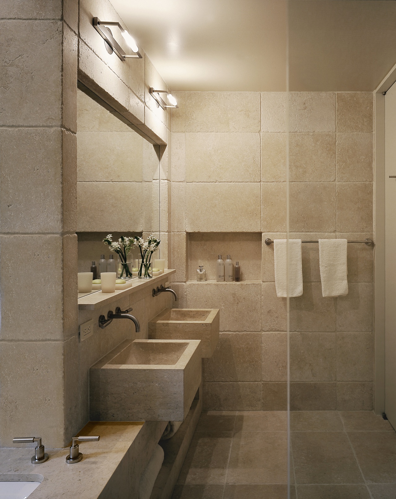 View of this bathroom featuring two seater bathtub, architecture, bathroom, floor, flooring, interior design, plumbing fixture, room, sink, tile, wall, brown, orange