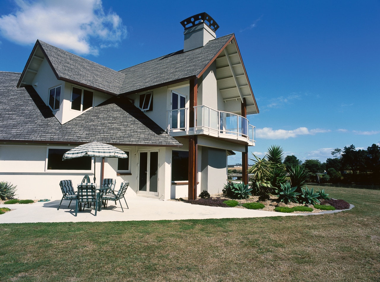 Exterior view of home with cream cladding and cottage, elevation, estate, facade, farmhouse, home, house, mansion, property, real estate, residential area, roof, siding, villa, window