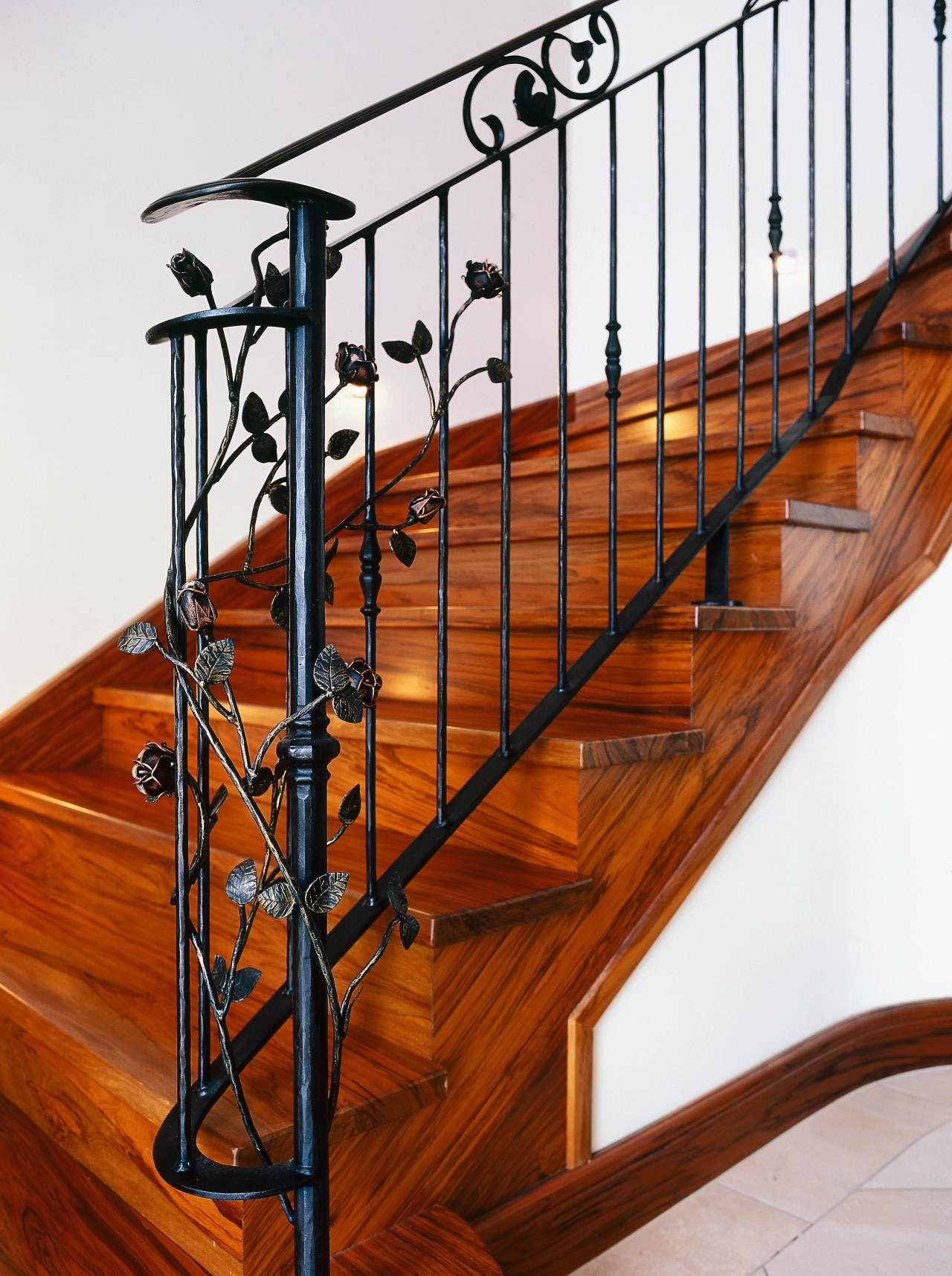 Timber staircase with ornate steel balustrading. baluster, handrail, iron, stairs, structure, wood, white, brown