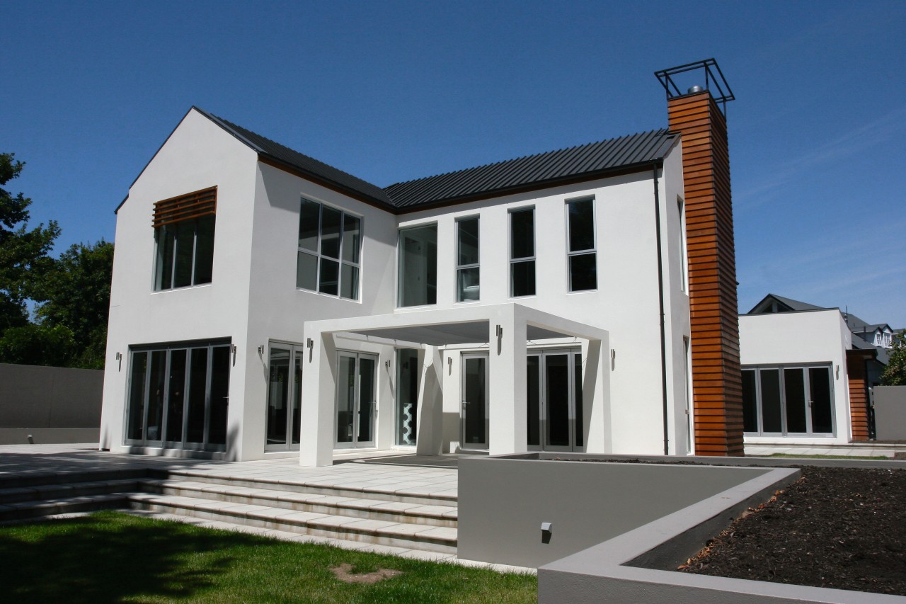 Exterior view of two storey home with plaster architecture, building, elevation, estate, facade, home, house, property, real estate, residential area, villa, window, blue, gray