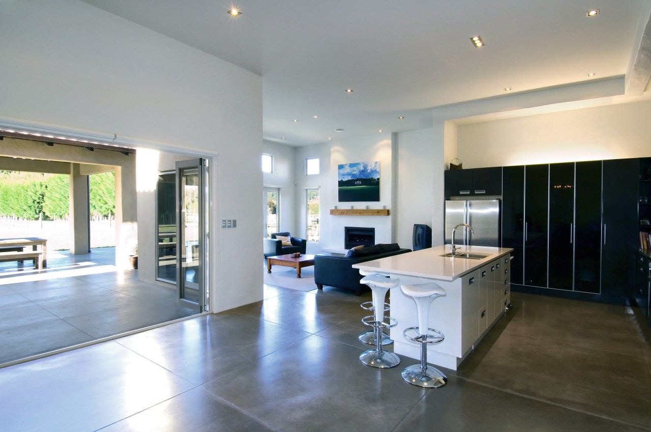 Large open plan kitchen area with white and architecture, countertop, estate, floor, flooring, home, house, interior design, kitchen, living room, property, real estate, room, wood flooring, gray