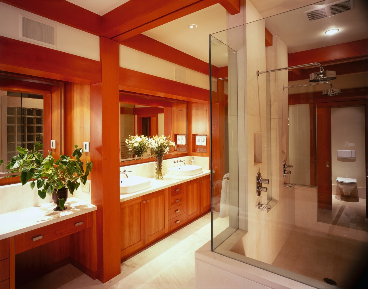 view of this bathroom featuring cherry wood vanity/cabinetry, cabinetry, ceiling, countertop, interior design, kitchen, real estate, room, red, orange, brown