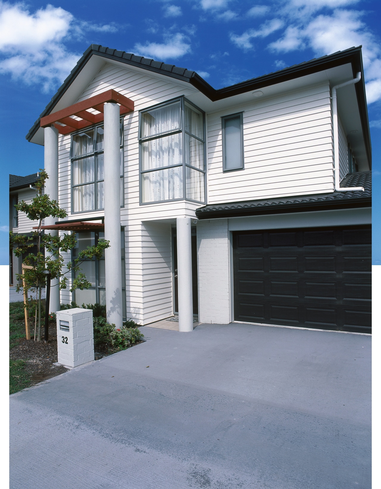 Two storey weatherboard home with columns at front building, elevation, estate, facade, home, house, property, real estate, residential area, siding, window, gray