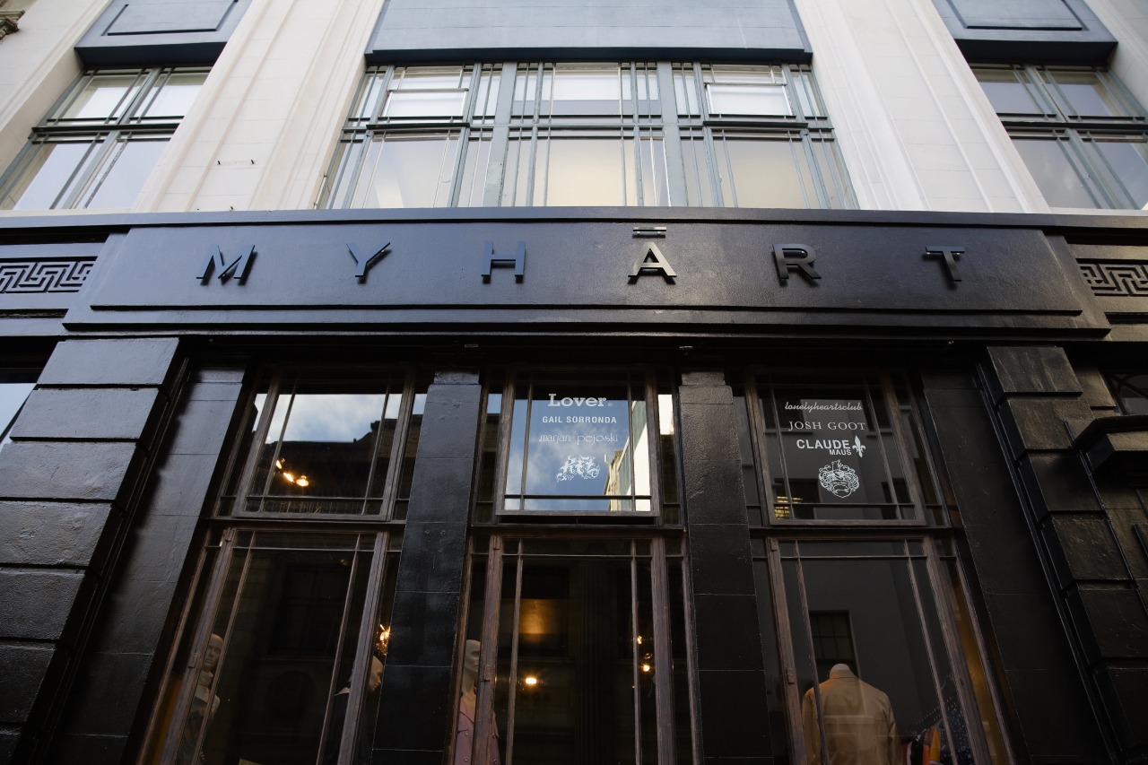 An exterior view of the building. architecture, building, city, facade, landmark, metropolitan area, window, black, gray