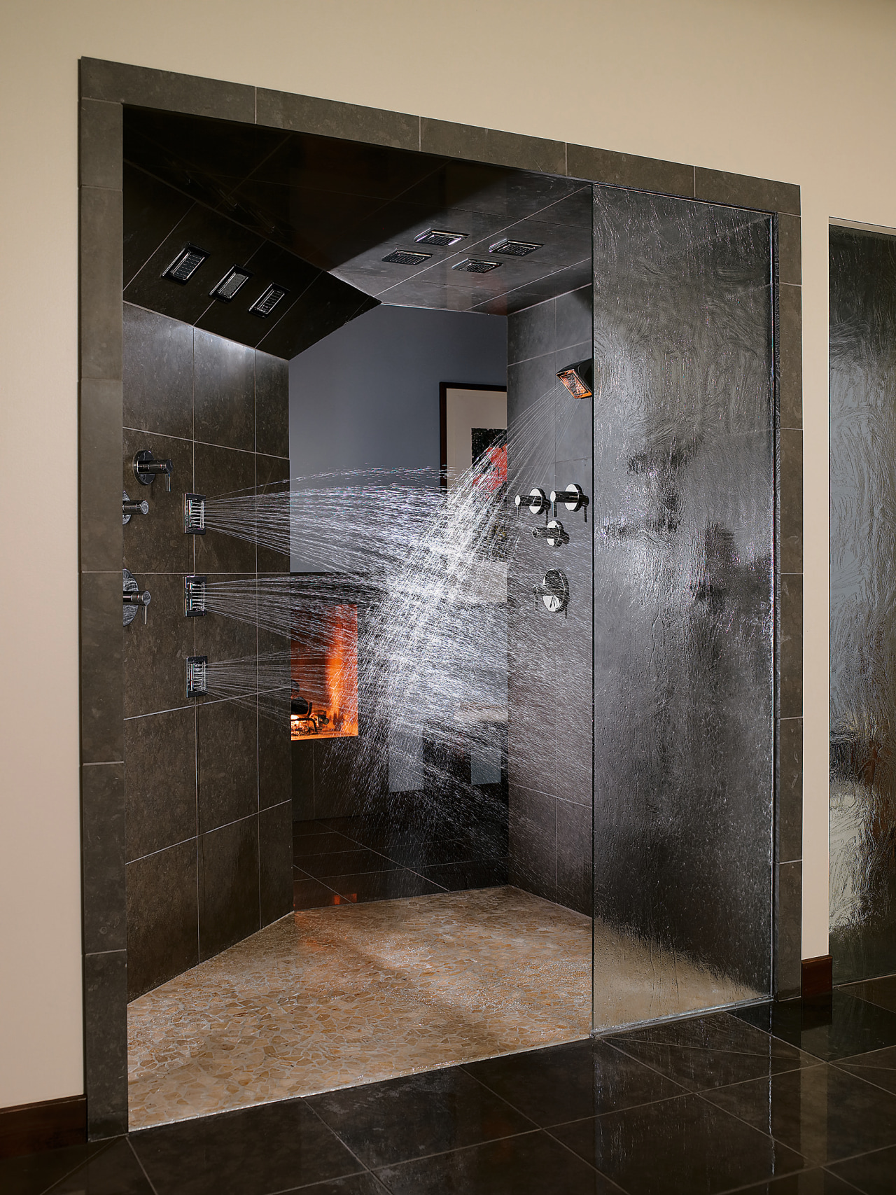 A view of a shower by Kohler. bathroom, floor, flooring, glass, interior design, room, wall, black