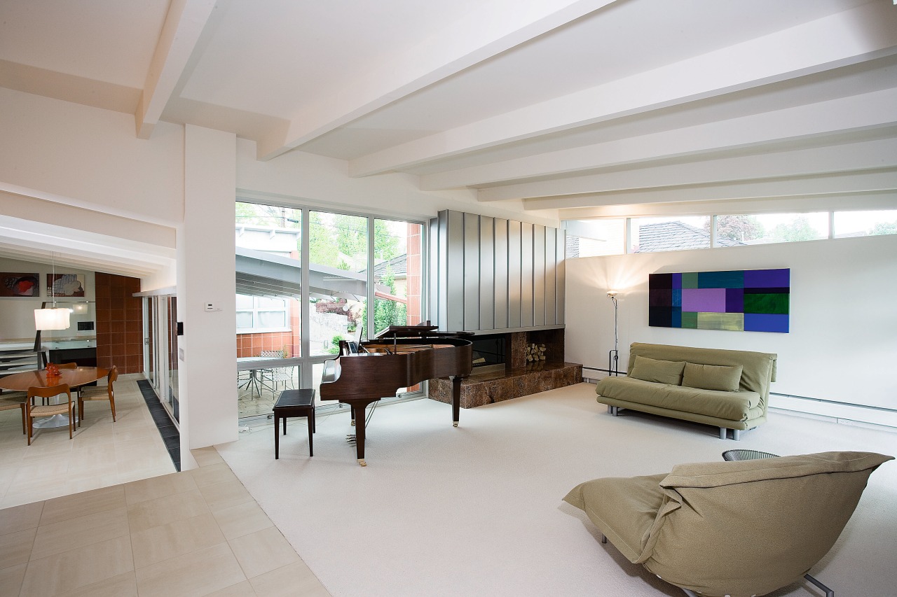 view of the lounge and stairs featuing white ceiling, house, interior design, living room, real estate, room, gray