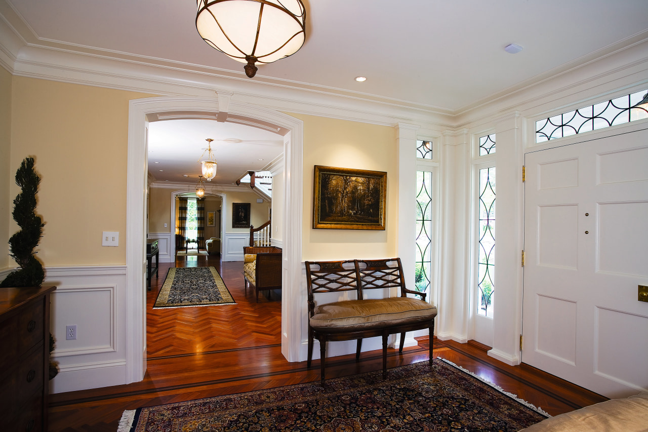 view of the entrance foyer featuring lead sidelight ceiling, dining room, estate, floor, flooring, hardwood, home, interior design, living room, property, real estate, room, wall, window, wood flooring, gray