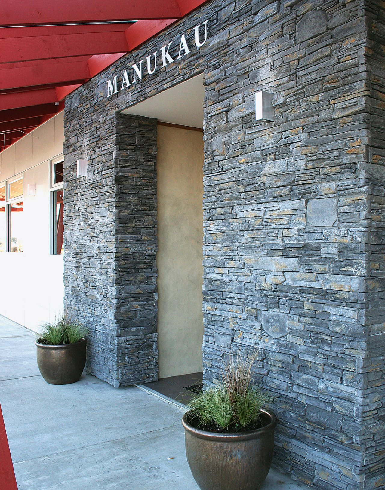 A view of some stone from Alpine Stone. architecture, door, facade, house, wall, window, gray