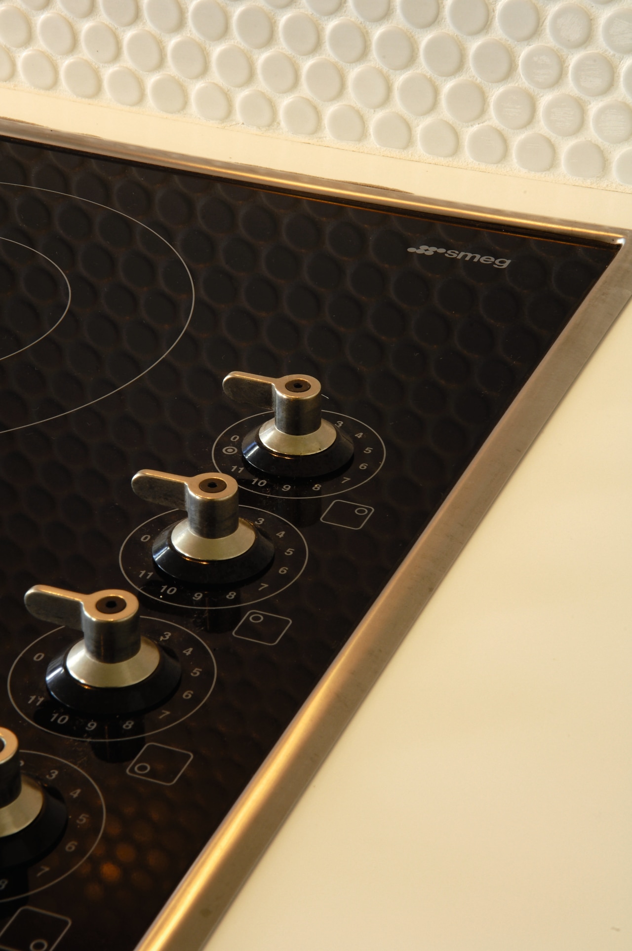 View of ceramic cooktop. flooring, product design, table, black, orange
