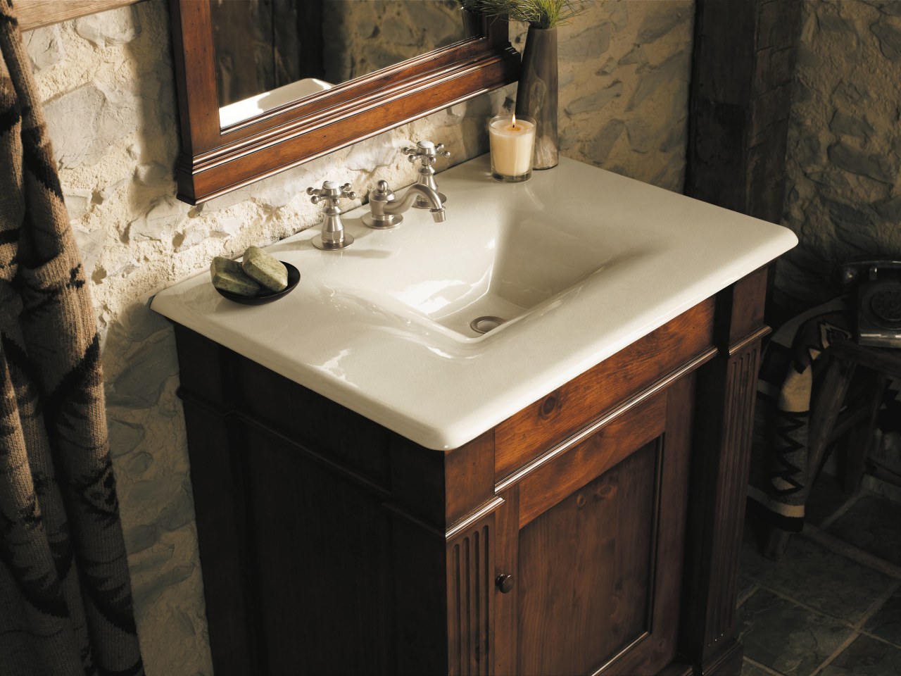 A view of a vanity by Kohler. bathroom, cabinetry, countertop, plumbing fixture, room, sink, black