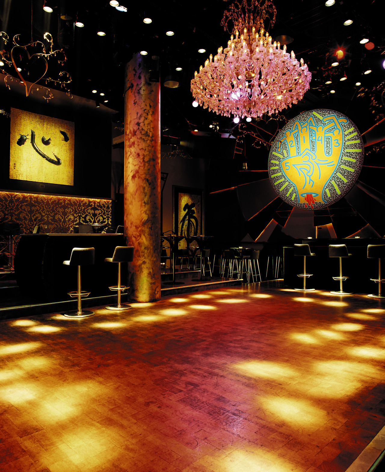 view of the dancefloor featuring end grain wood entertainment, lighting, night, stage, theatre, black