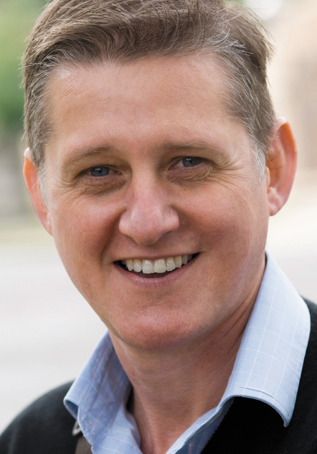 portrait shot of Darryl Gordon business executive, businessperson, cheek, chin, entrepreneur, executive officer, eyebrow, facial expression, forehead, hairstyle, person, professional, senior citizen, smile, white, red