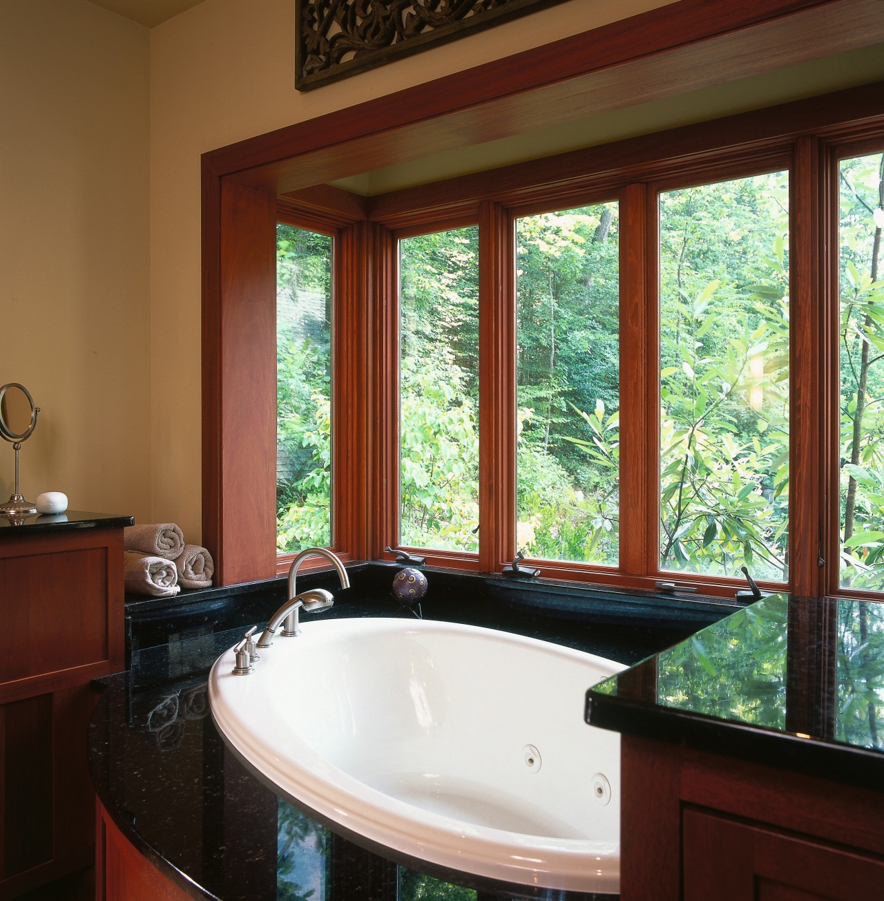 view of the bathroom featuring travertine and granite bathroom, countertop, daylighting, estate, home, interior design, real estate, room, window, wood, red, brown