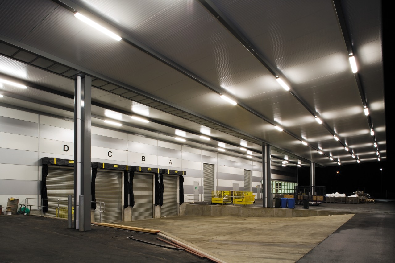 A view of the lighting in the loading airport terminal, ceiling, daylighting, lighting, metropolitan area, parking, parking lot, structure, black, gray