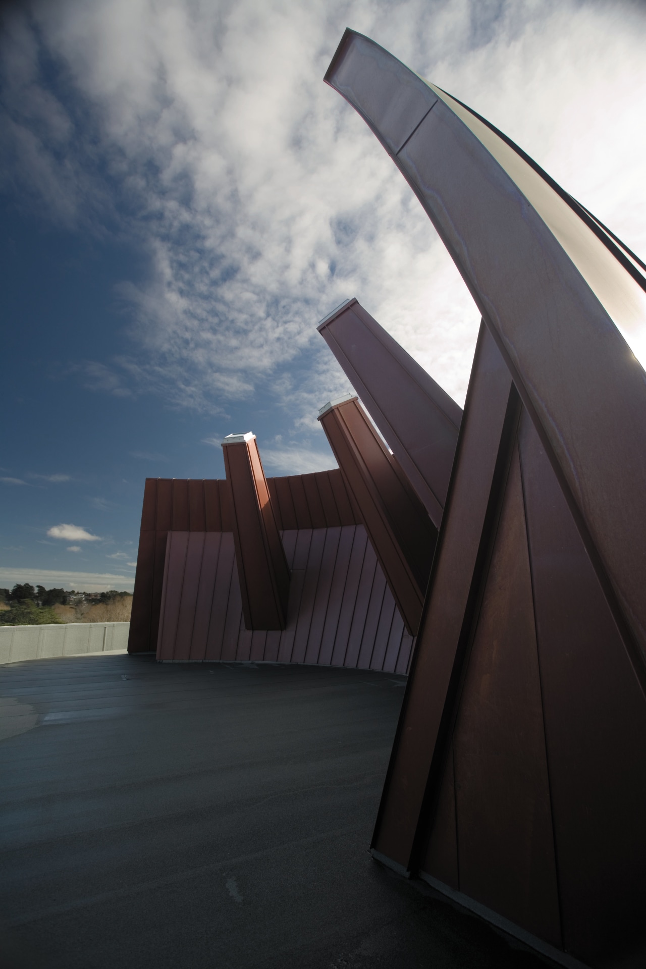 A view of the copper clad roofing. angle, architecture, cloud, daylighting, house, line, reflection, sky, sunlight, wood, black