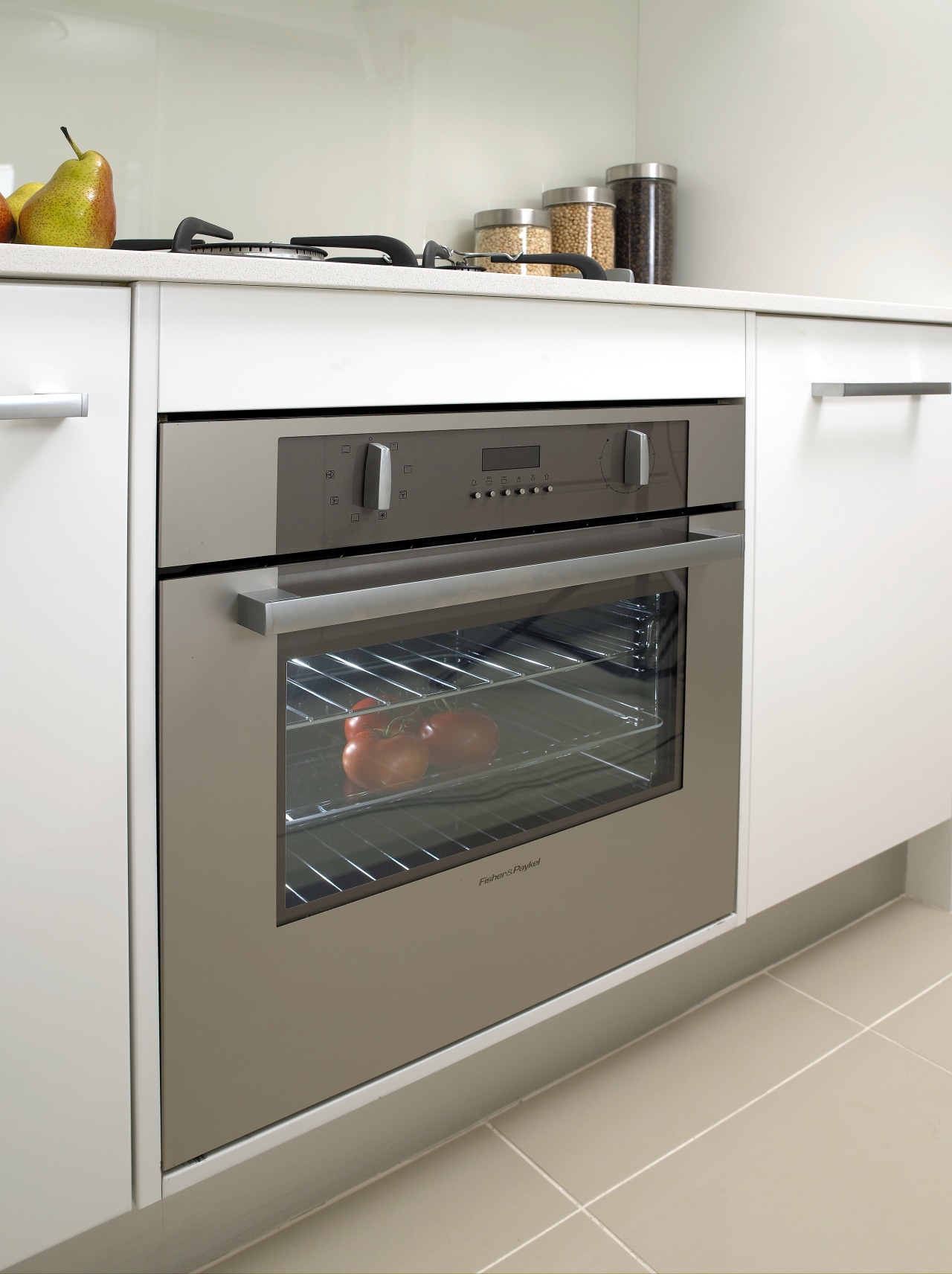 View of this Mondail Apartment featuring Fisher & countertop, gas stove, home appliance, kitchen, kitchen appliance, kitchen stove, major appliance, microwave oven, oven, product, white, gray