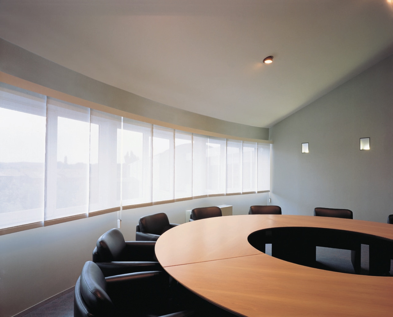 A view of some window shades. architecture, ceiling, conference hall, daylighting, interior design, office, table, window, gray