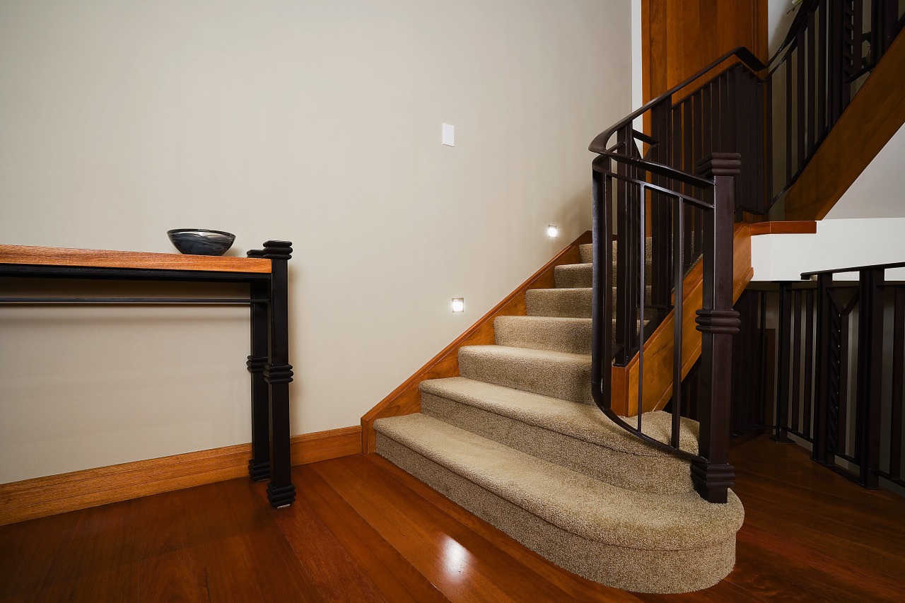 A view of a staircase from Knob's &amp; floor, flooring, handrail, hardwood, home, interior design, property, room, stairs, wood, wood flooring, gray, brown