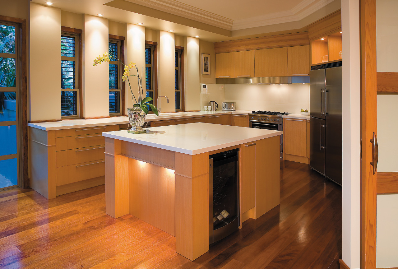 A view of a granite kitchen by the cabinetry, countertop, floor, flooring, hardwood, interior design, kitchen, real estate, room, wood, wood flooring, brown, orange