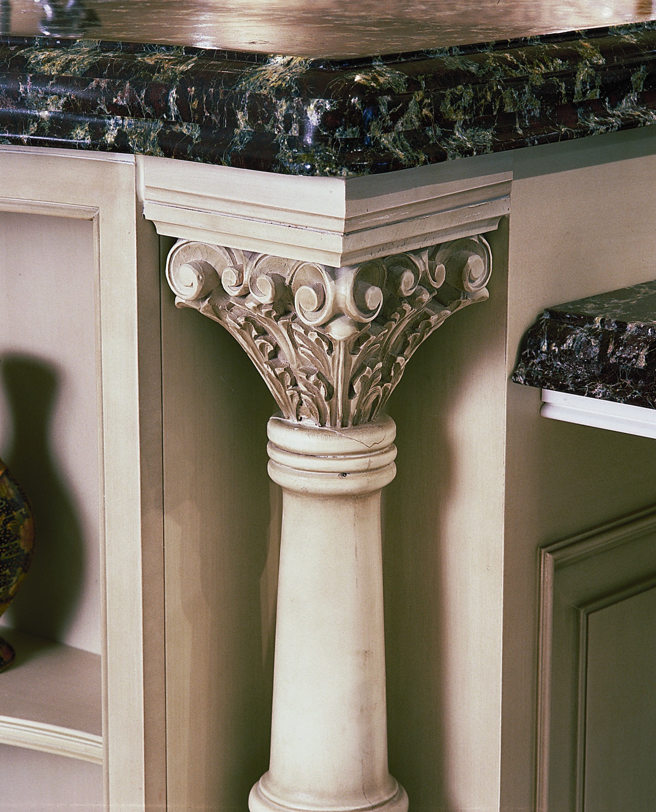 view of this kitchen featuring handcafted cream kitchen column, furniture, structure, brown, gray