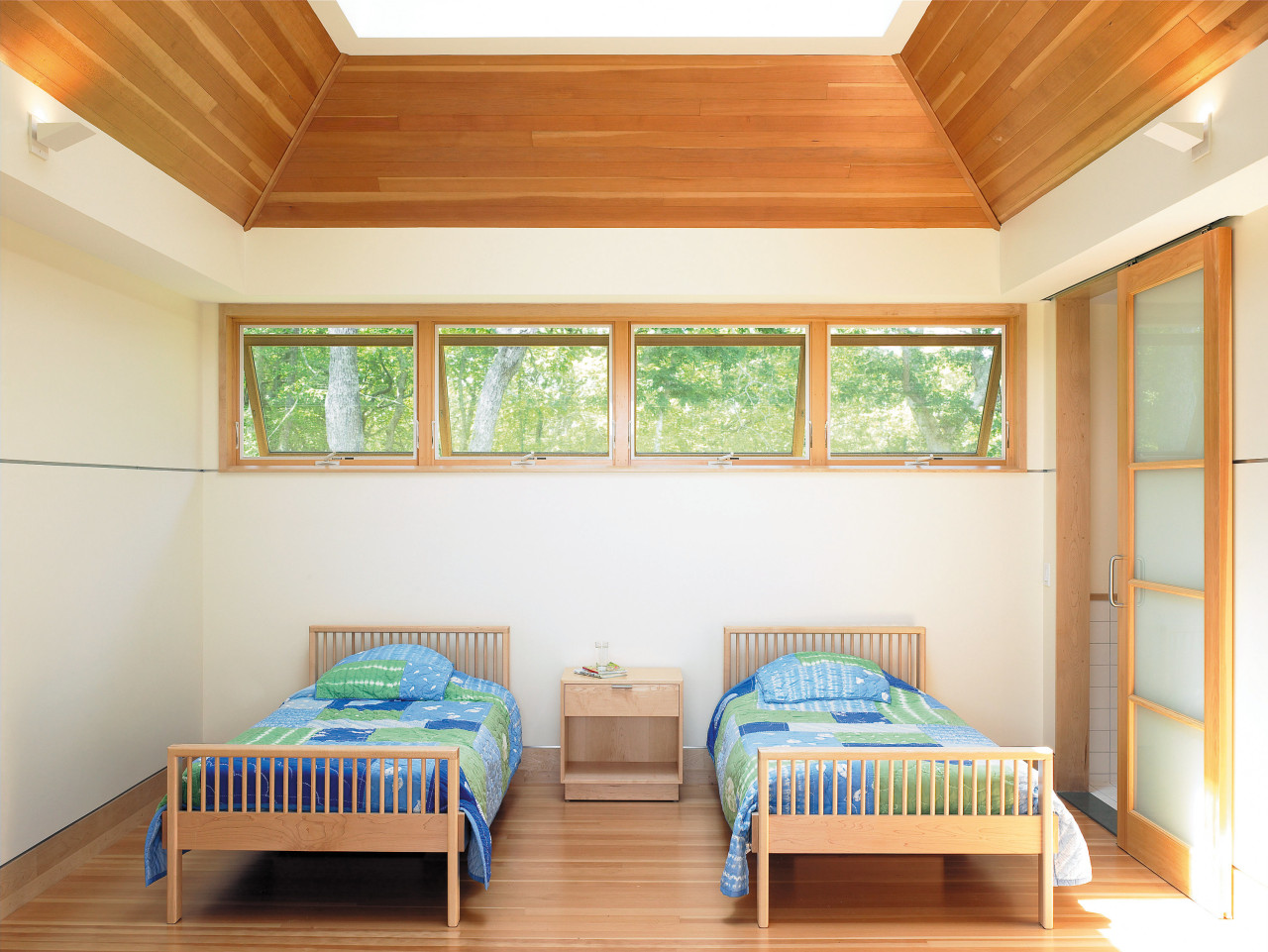 view of the bedroom featuring fir flooring, two architecture, bed, bed frame, bedroom, ceiling, daylighting, estate, floor, home, house, interior design, living room, real estate, room, wall, window, wood, white, orange