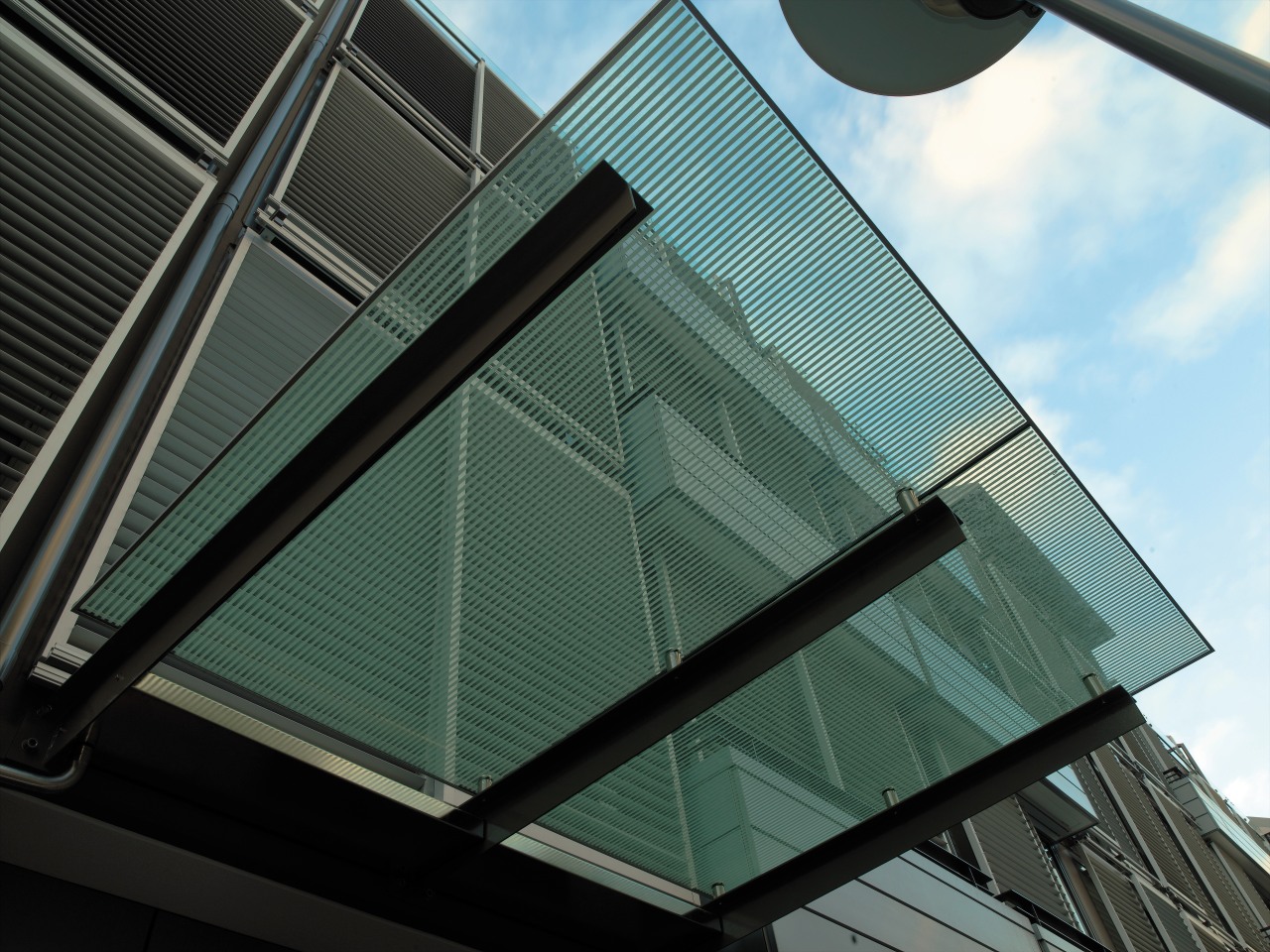 view of the steel  beams holding the angle, architecture, building, commercial building, corporate headquarters, daylighting, daytime, facade, glass, house, line, roof, siding, sky, skyscraper, structure, window, black