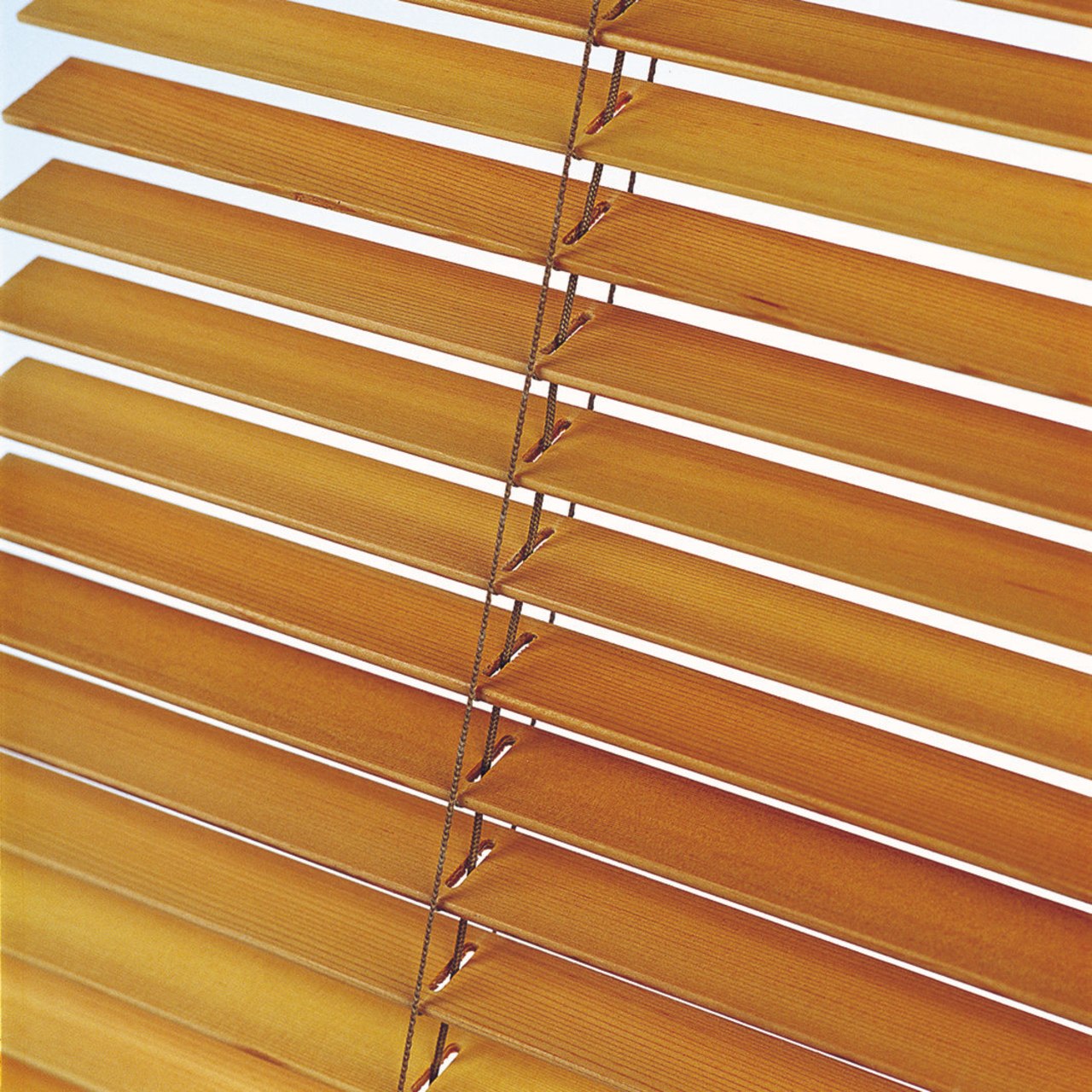 A view of some blinds from Window Treatments. angle, line, material, mesh, metal, wall, window blind, window covering, wood, wood stain, orange, brown