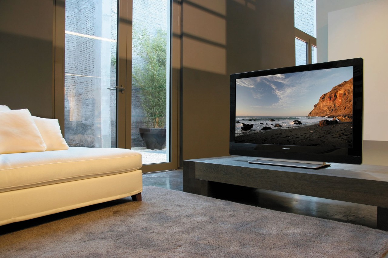 View of lounge room with home theatre systems, floor, flooring, furniture, home, interior design, living room, room, window, gray, black