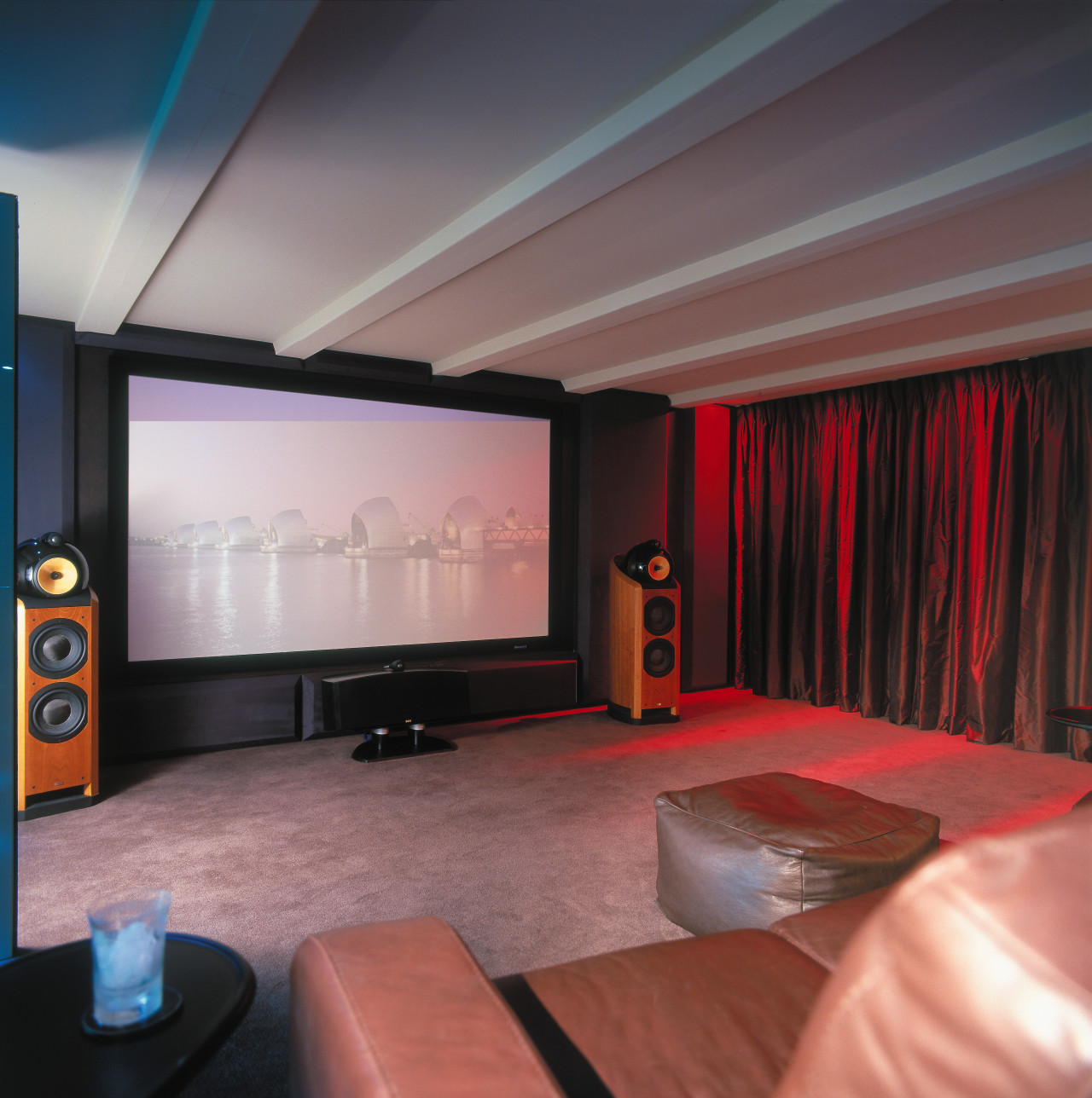 view of the theatre featuring brown leather furniture, ceiling, entertainment, interior design, living room, room, black, gray, red