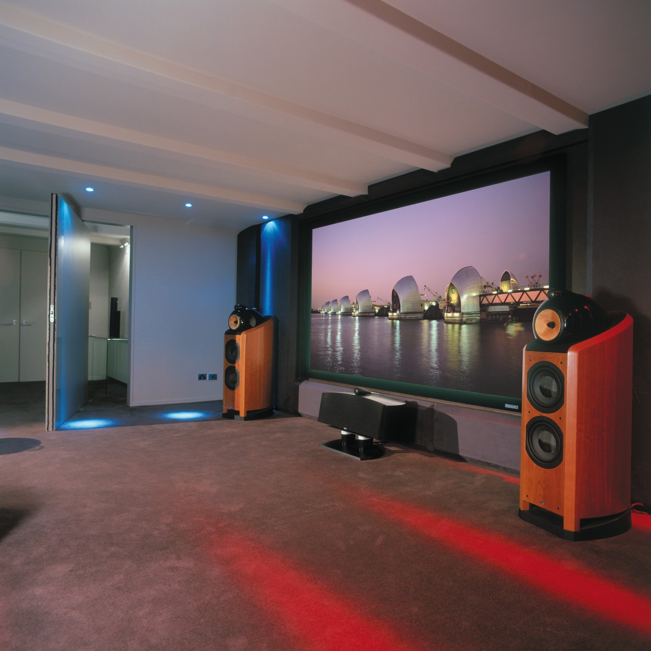 view of the theatre featuring brown leather furniture, ceiling, flooring, interior design, room, gray, red