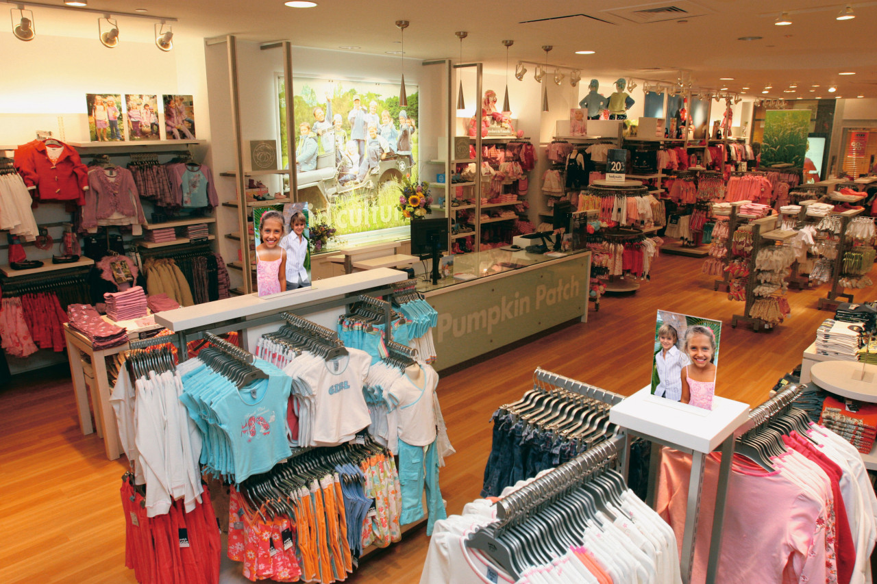 A view of a shop fitout by Espie. boutique, outlet store, retail, shopping, brown