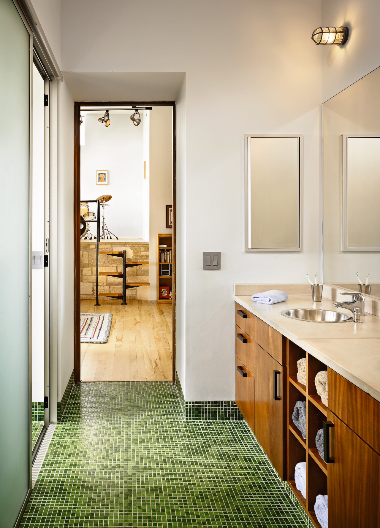 view of the bathroom featuring timber veneer cabinetry, architecture, bathroom, floor, flooring, home, interior design, real estate, room, white