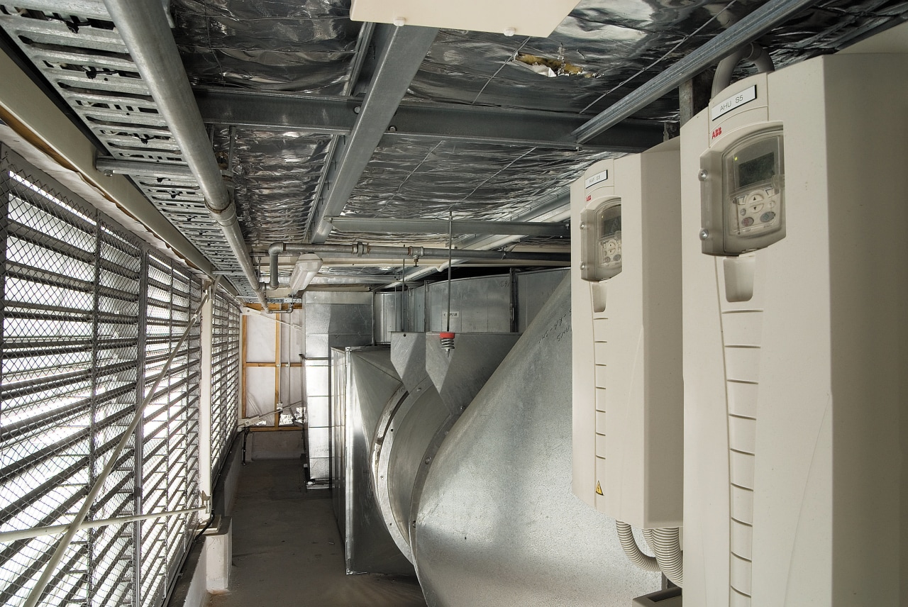 A view of a air conditioning system by gray, black